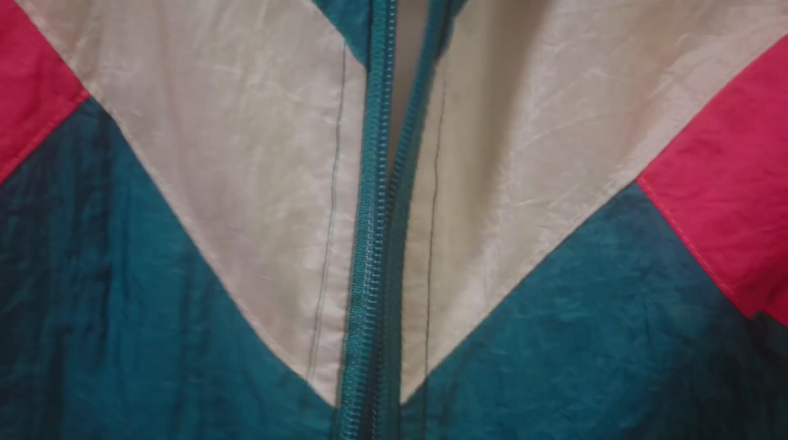 a close up of a jacket with a red, white, and blue design