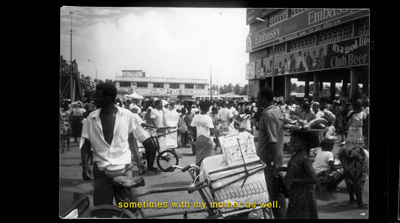 a black and white photo of a crowd of people