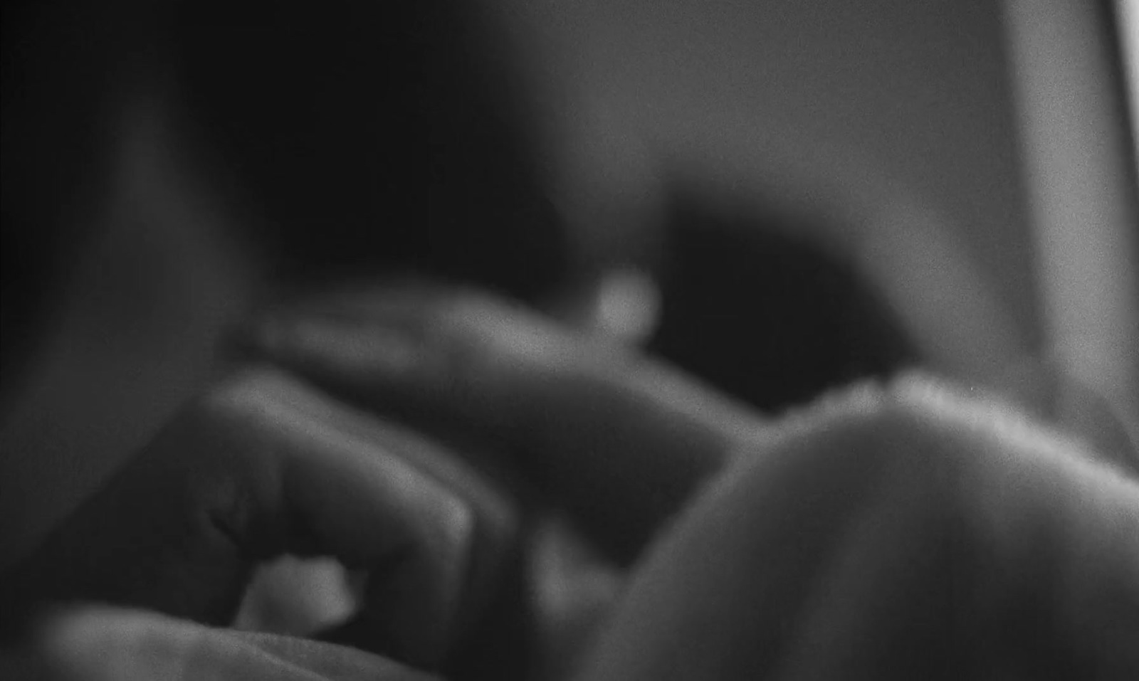 a close up of a person's hand with a blurry background