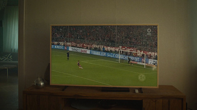 a picture of a soccer game on a tv screen