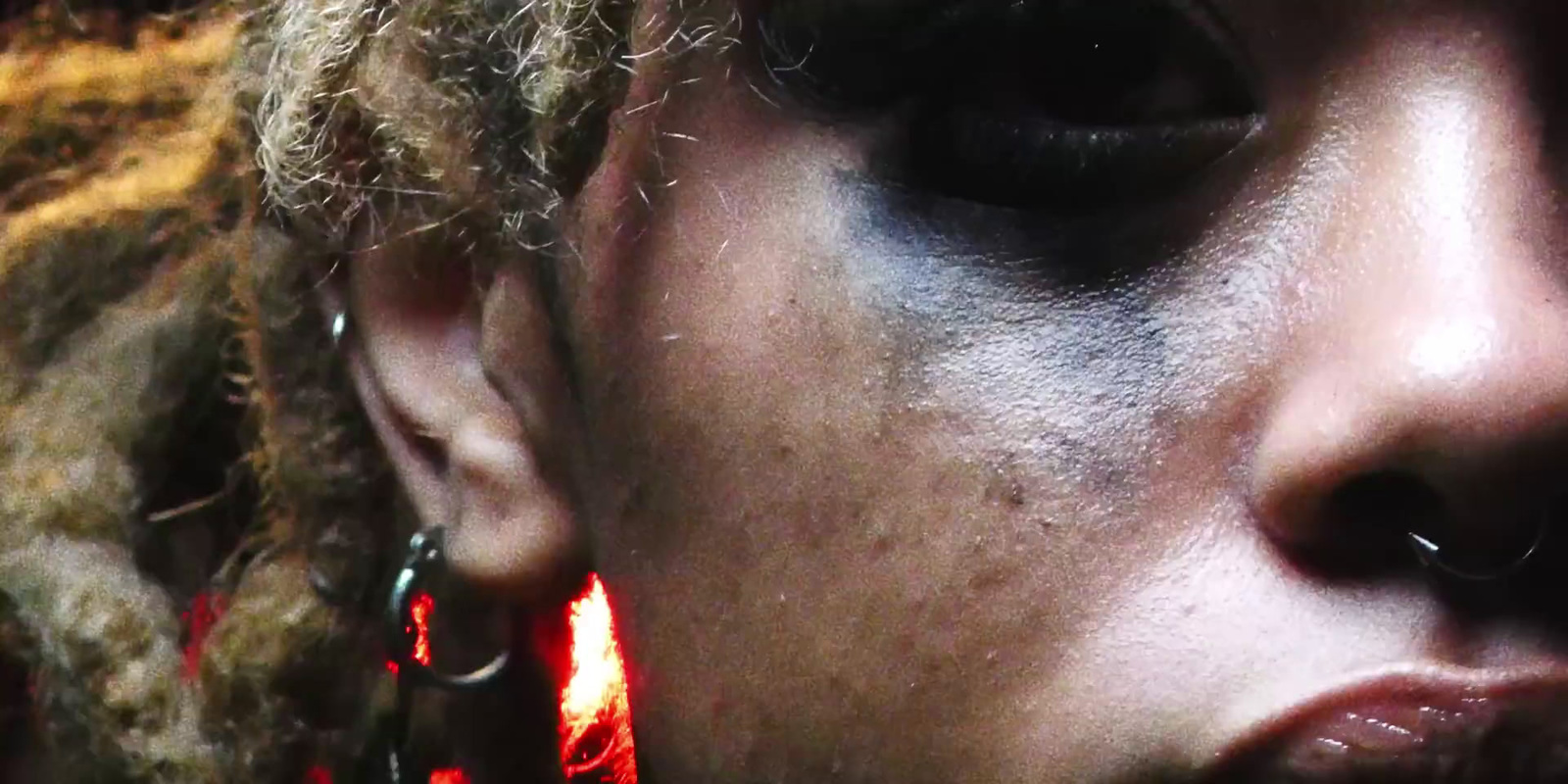 a close up of a person with makeup on