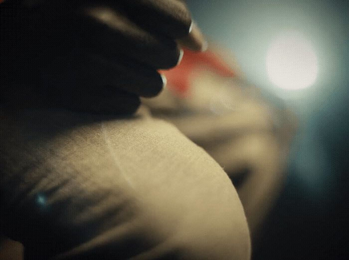 a close up of a person's arm with a blurry background