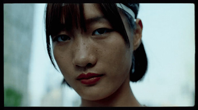 a close up of a woman with freckled hair