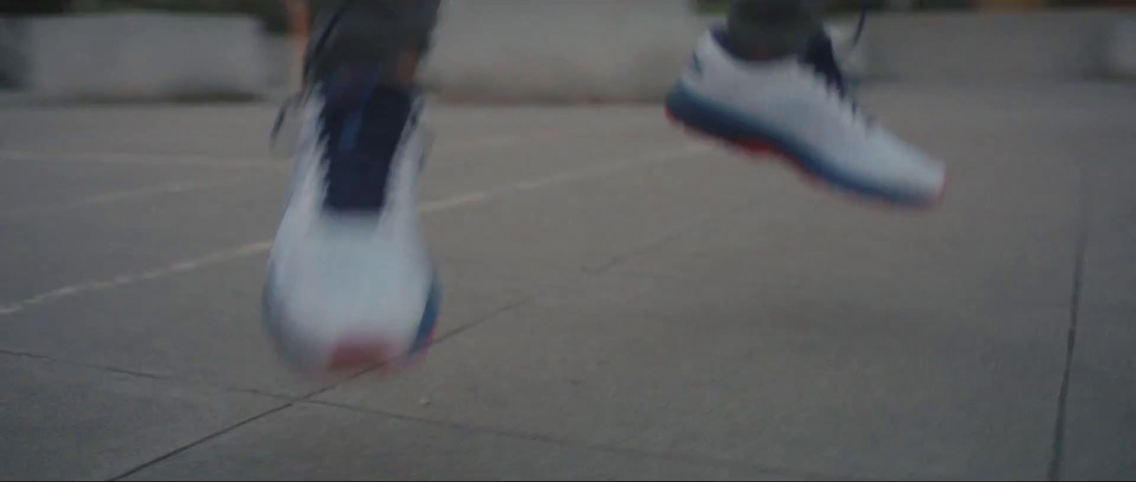 a person jumping in the air on a skateboard