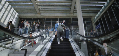 a group of people walking down a flight of stairs