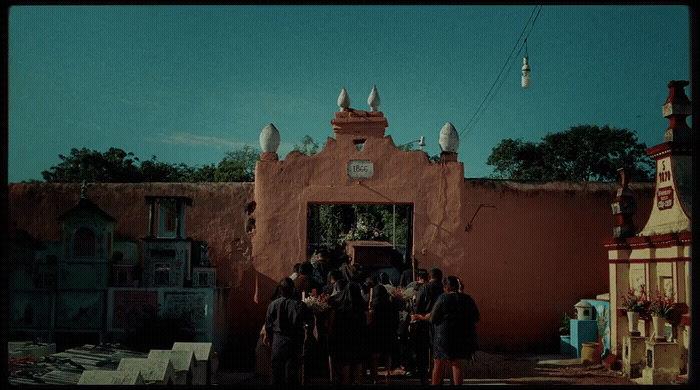 a group of people standing in front of a building