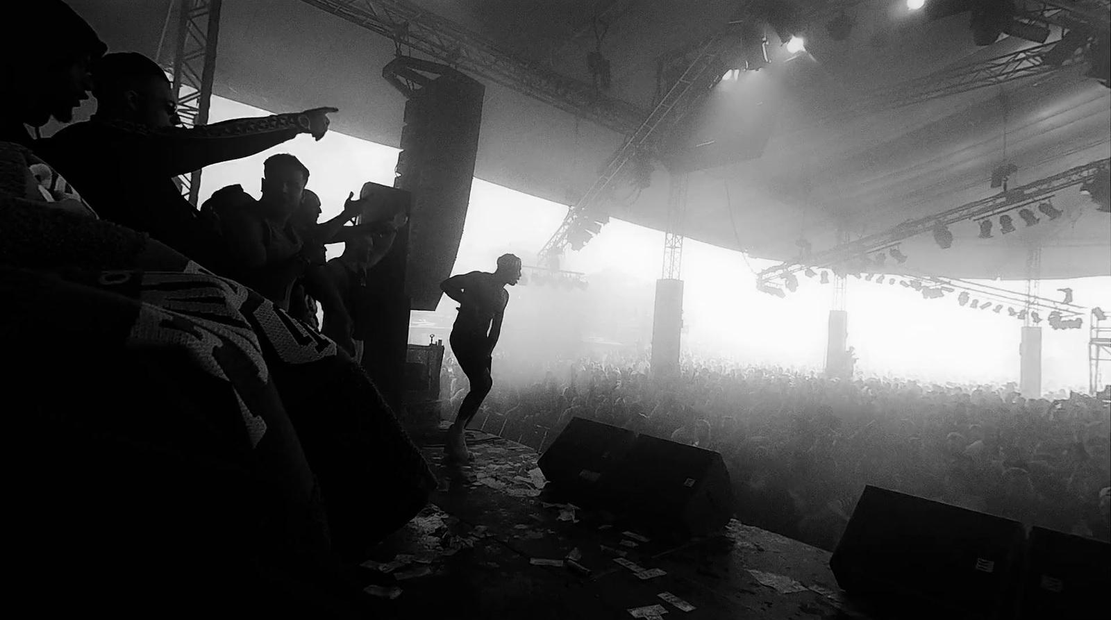 a group of people standing on top of a stage