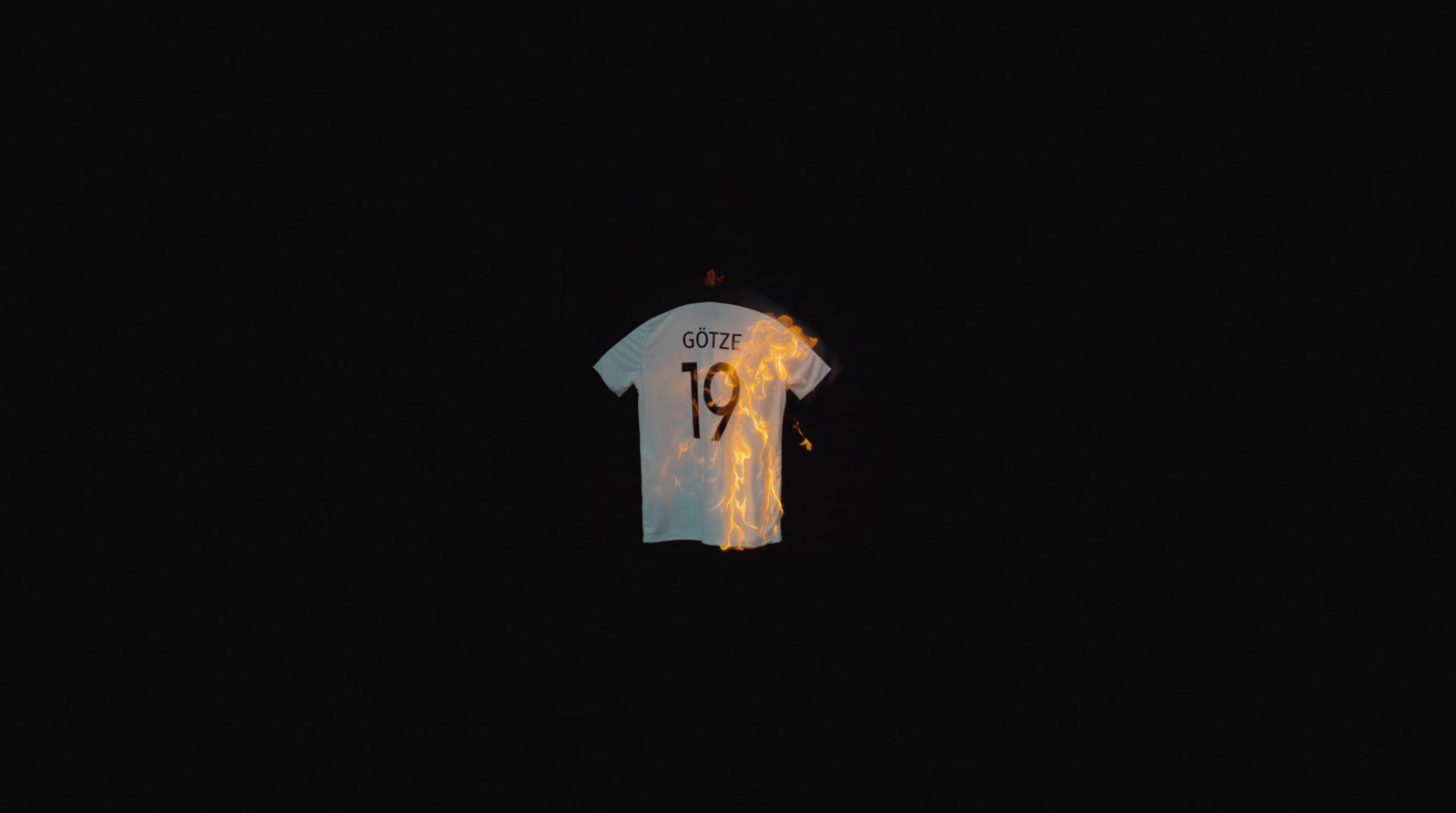 a white shirt with the number 19 on it