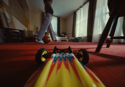 a close up of a toy car on the floor