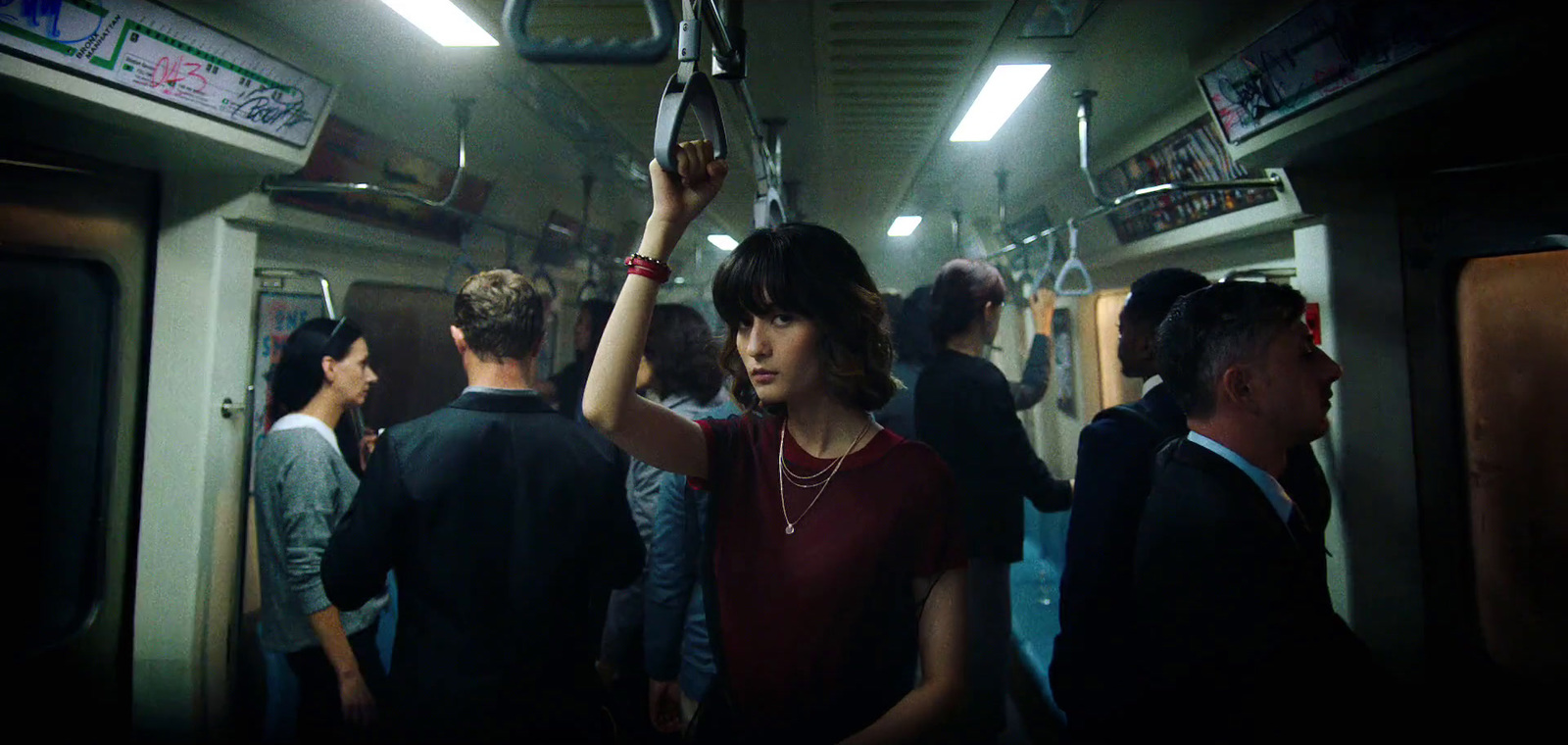 a group of people on a subway train