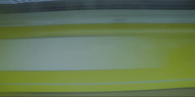 a close up of a yellow and white object