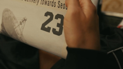 a person is reading a book with the number twenty twenty