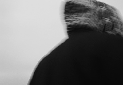 a black and white photo of a man's head