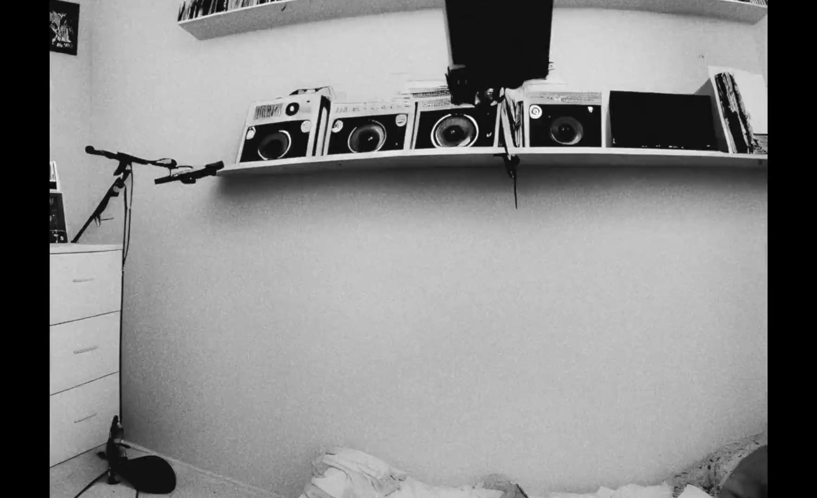 a black and white photo of a stereo system