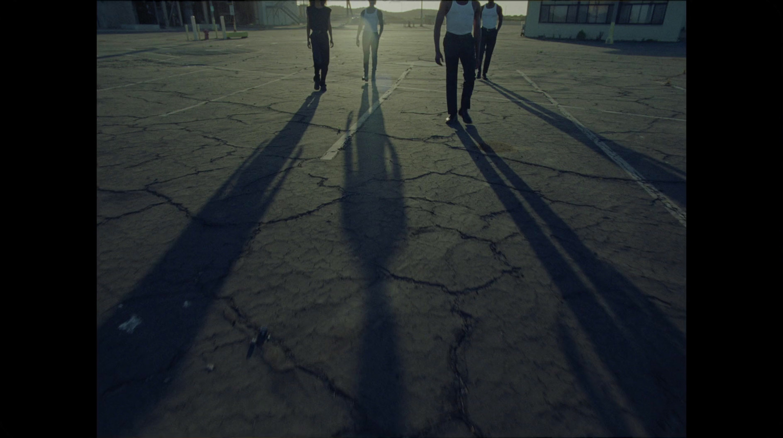 a group of people walking down a street