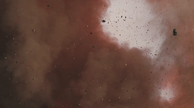 a group of birds flying through a cloudy sky