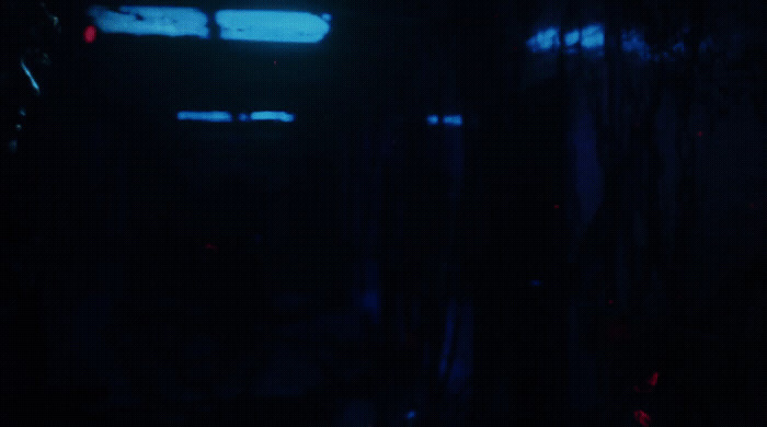 a blurry photo of a bus in the dark