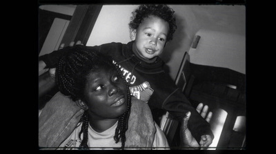 a black and white photo of two children