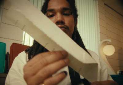 a man holding a pair of scissors in his hands