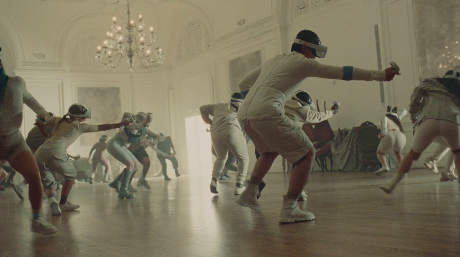 a group of people dancing in a large room