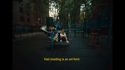 a group of children sitting on a playground