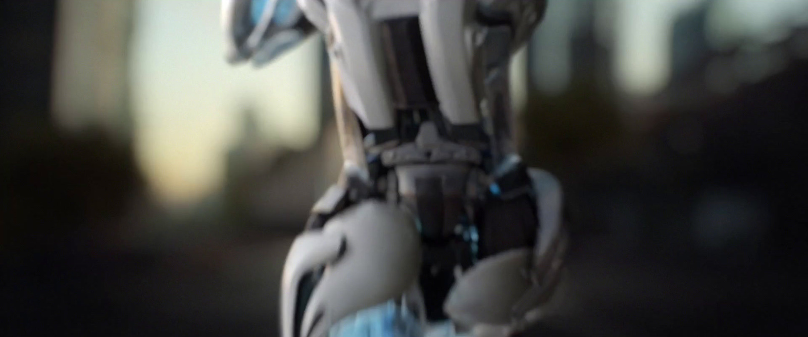 a close up of a robot with a blurry background