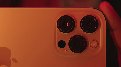 a close up of a person holding an iphone