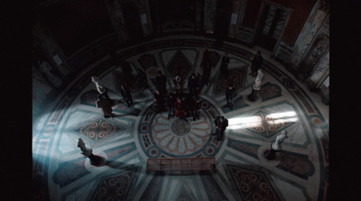 a group of people standing inside of a building