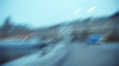 a blurry photo of a group of people riding bikes