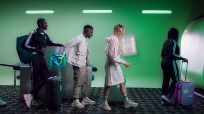 a group of people standing around with luggage