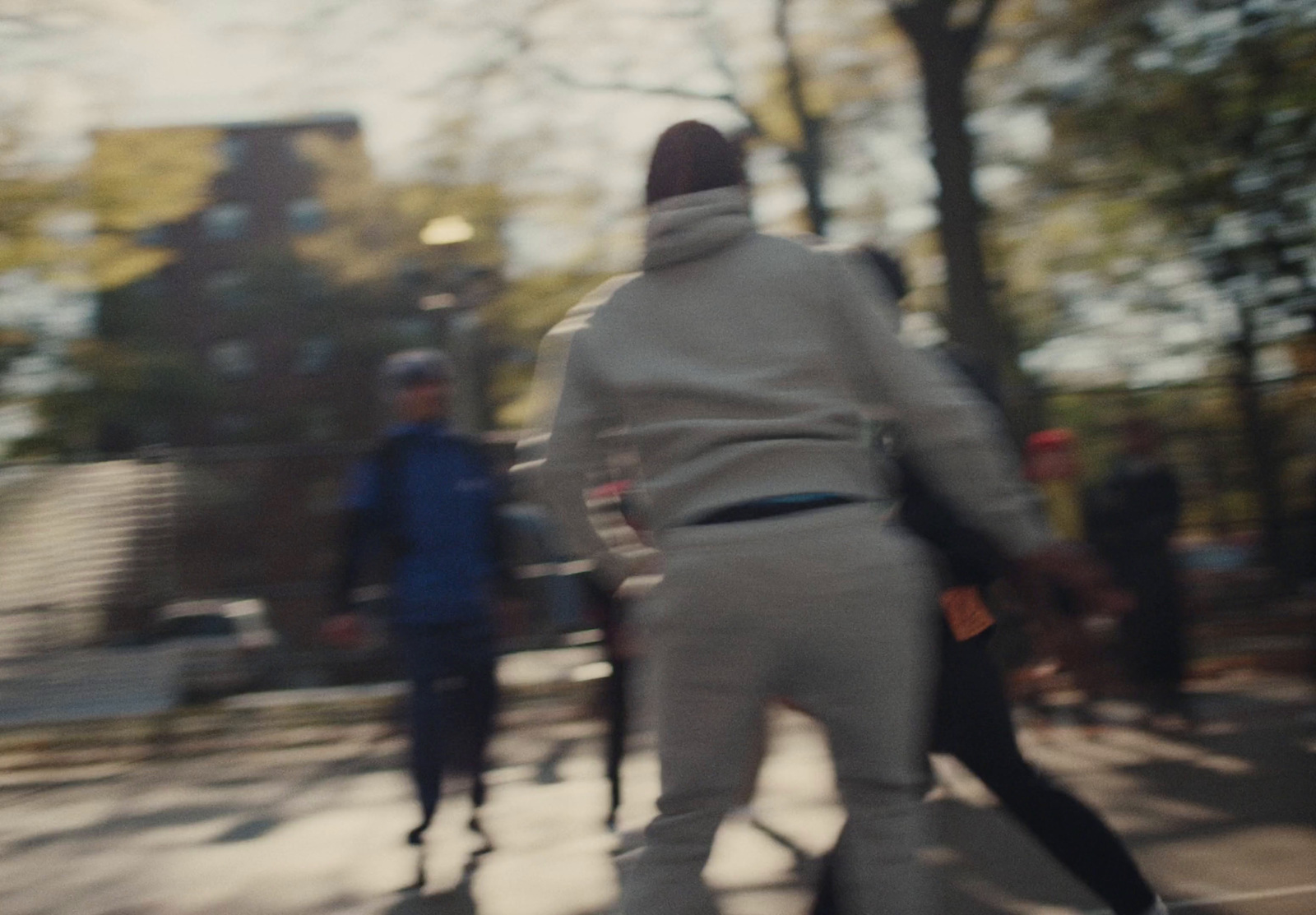 a blurry photo of a person riding a skateboard