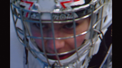 a close up of a hockey goalie's helmet