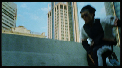 a man riding a skateboard down the side of a ramp