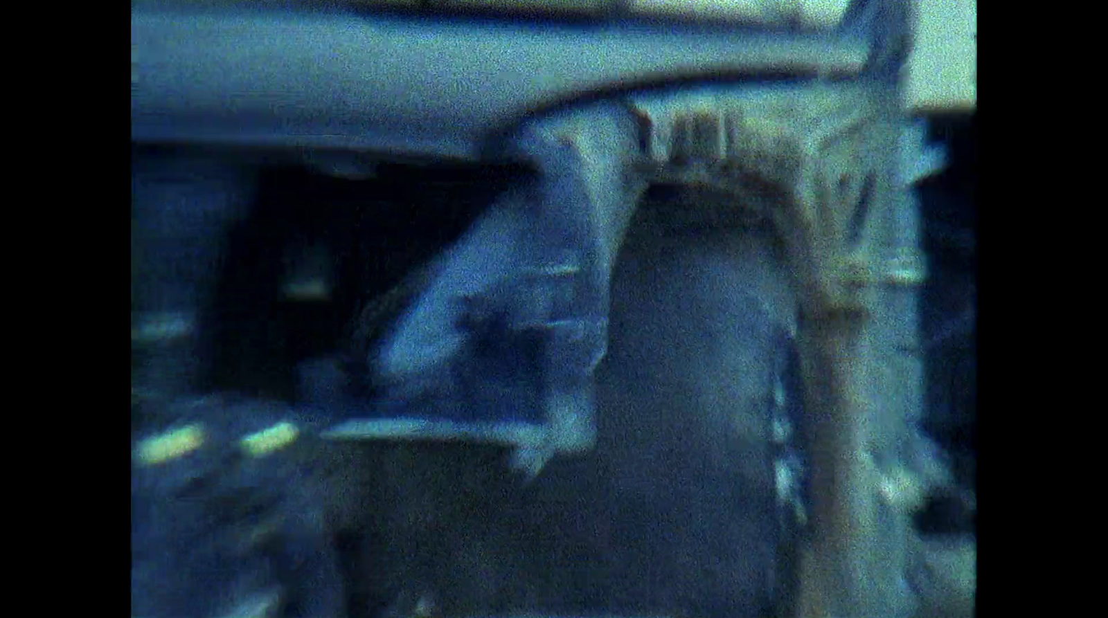 a blurry photo of a car's front bumper