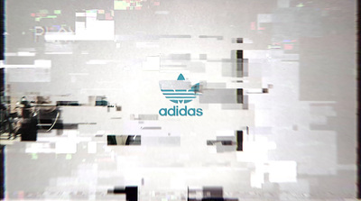 a picture of the adidas logo on a wall