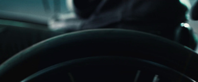 a close up of a steering wheel of a car