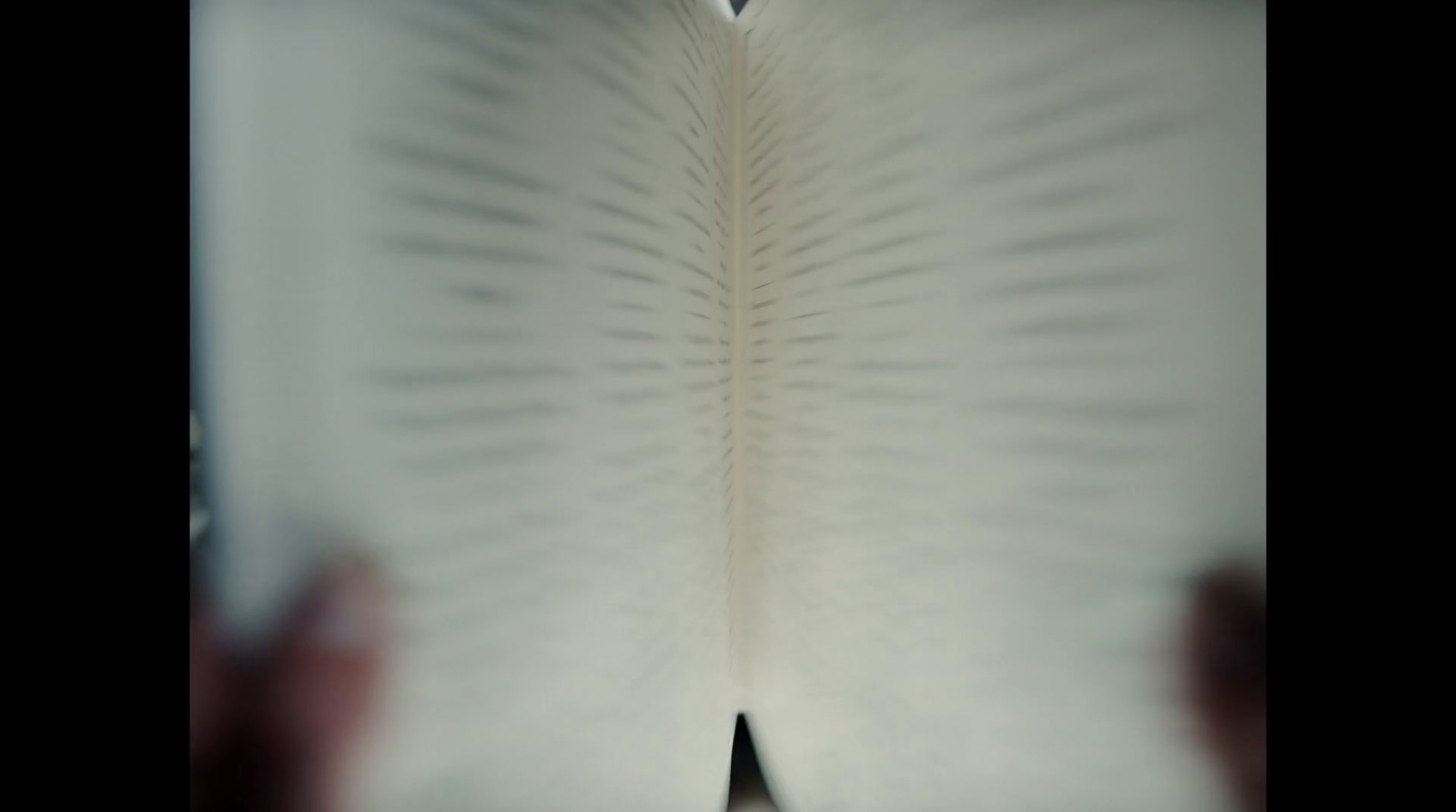 a close up of a book with a blurry background