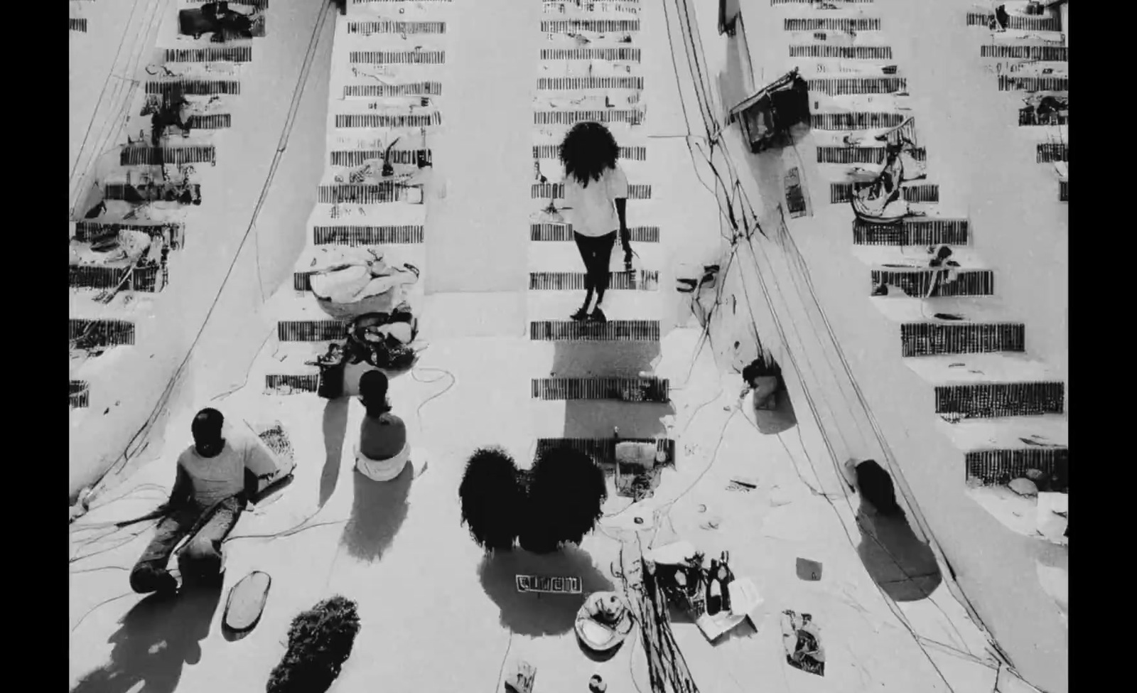 a black and white photo of a person standing on a ramp