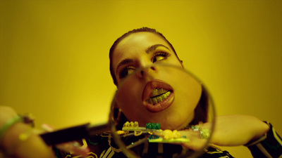 a woman looking through a magnifying glass