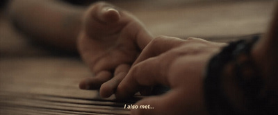 a close up of a person's hands on a table