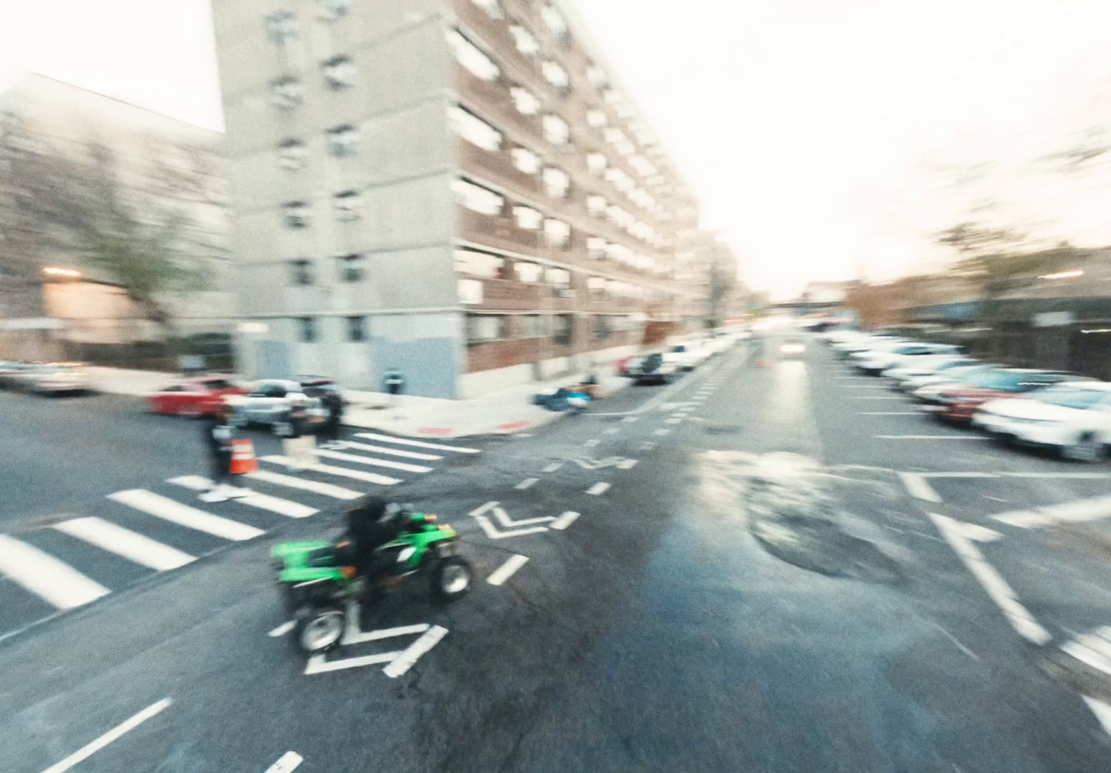 a person riding a motorcycle on a city street