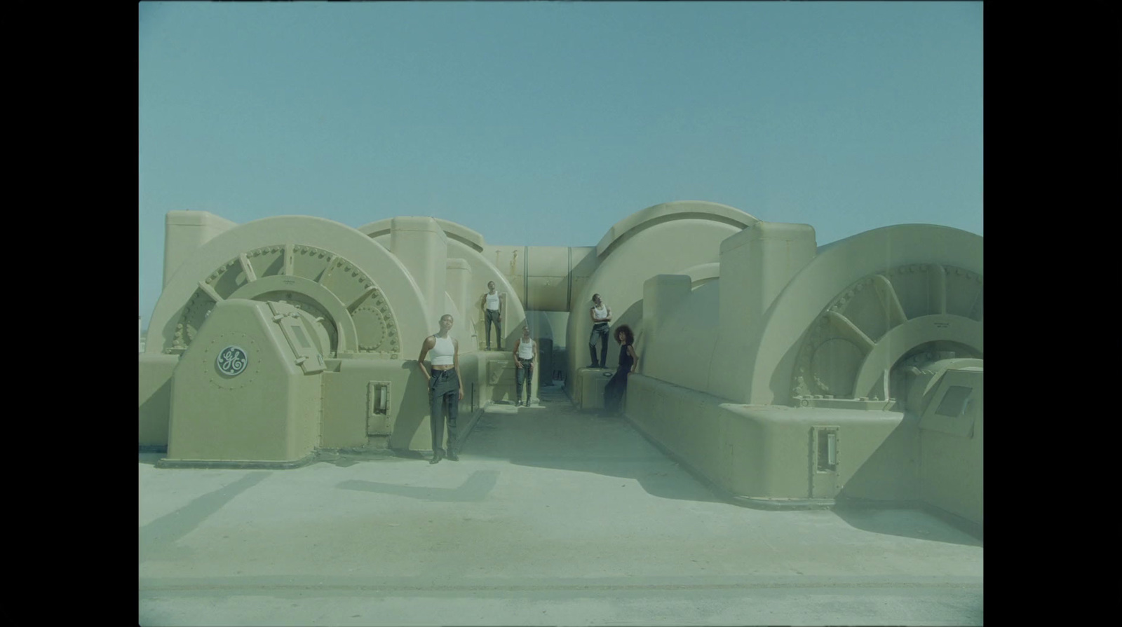 a group of people standing in front of a building