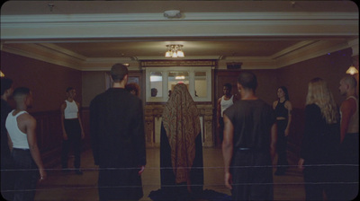 a group of people standing in a room