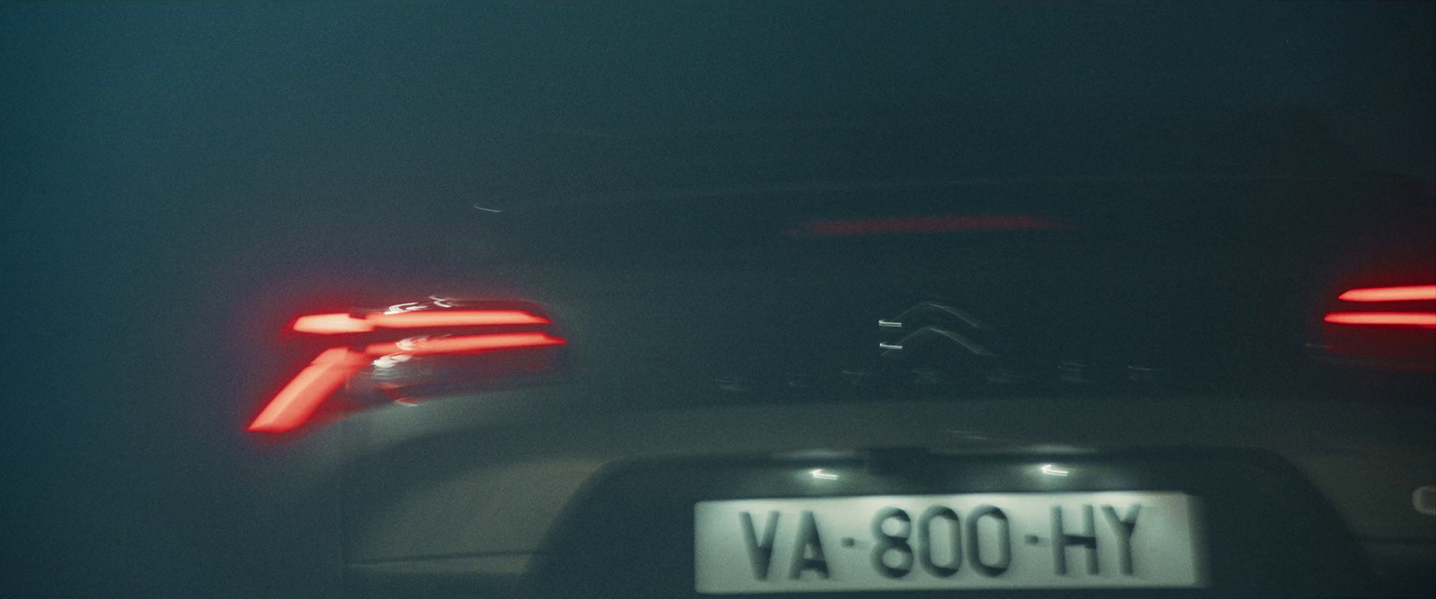 a close up of the tail lights of a car