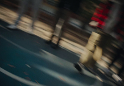 a blurry photo of a person riding a skateboard