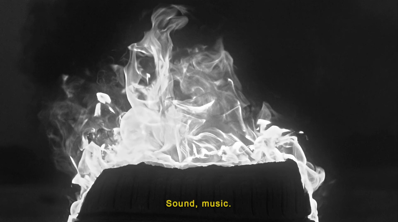 a black and white photo of a fire