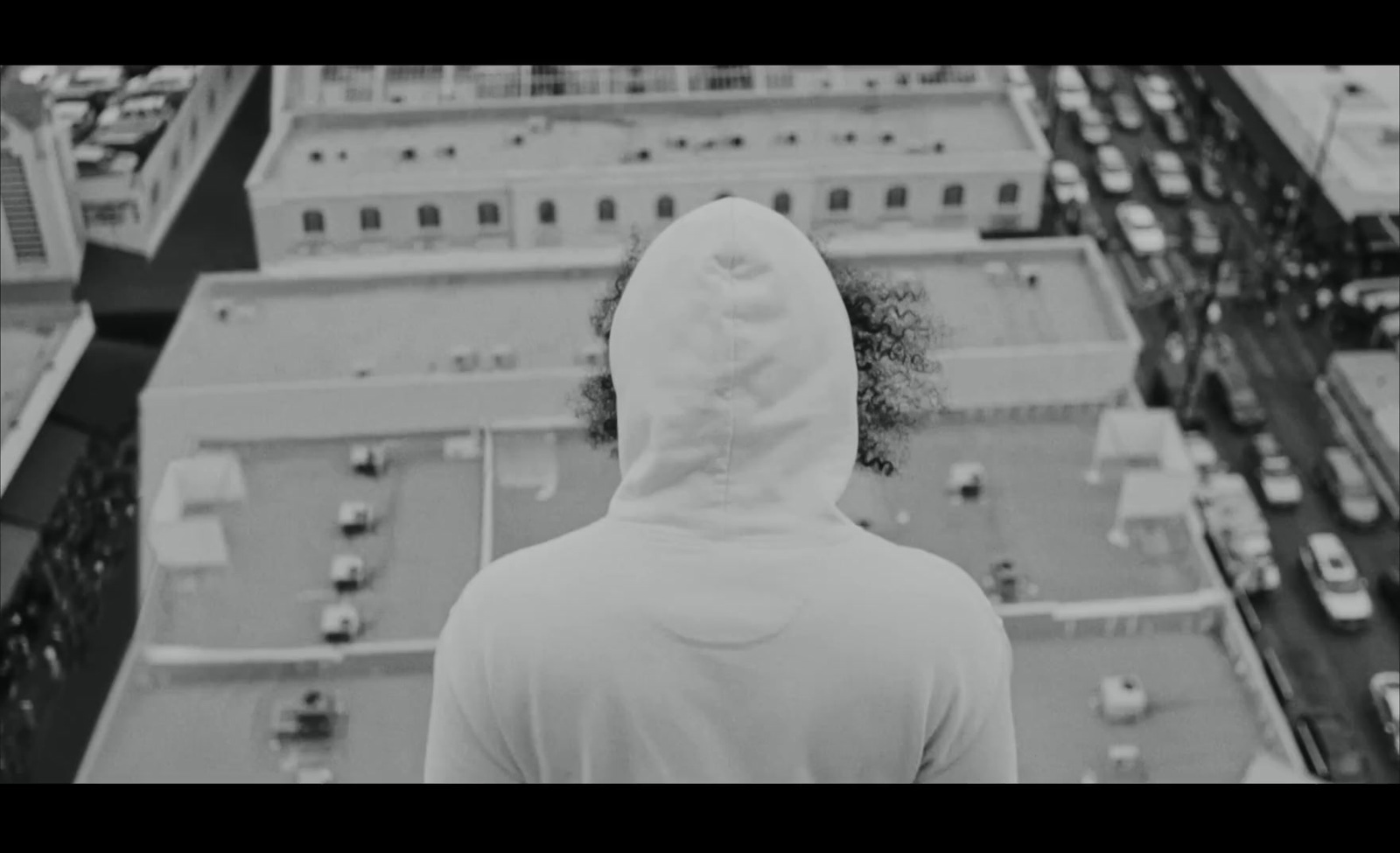 a person standing on top of a building