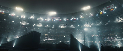 a large stadium filled with lots of lights