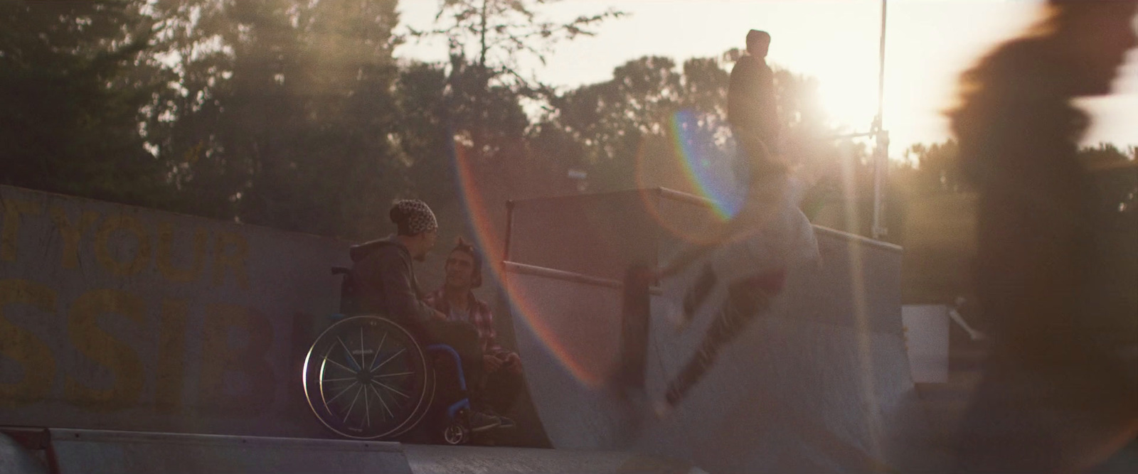 a man riding a skateboard up the side of a ramp