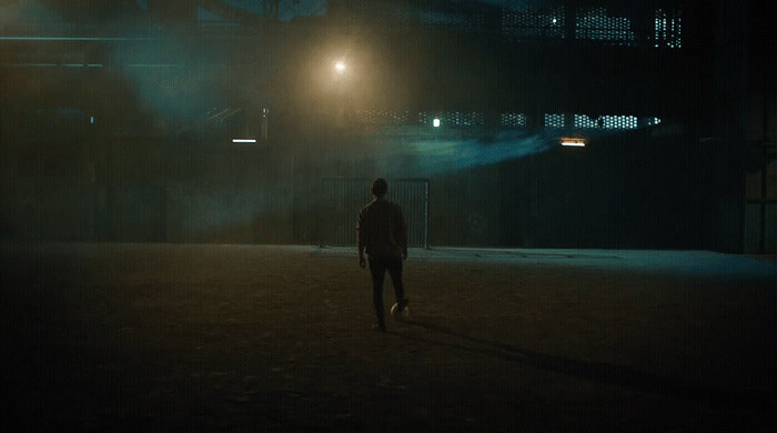 a man walking in the dark at night